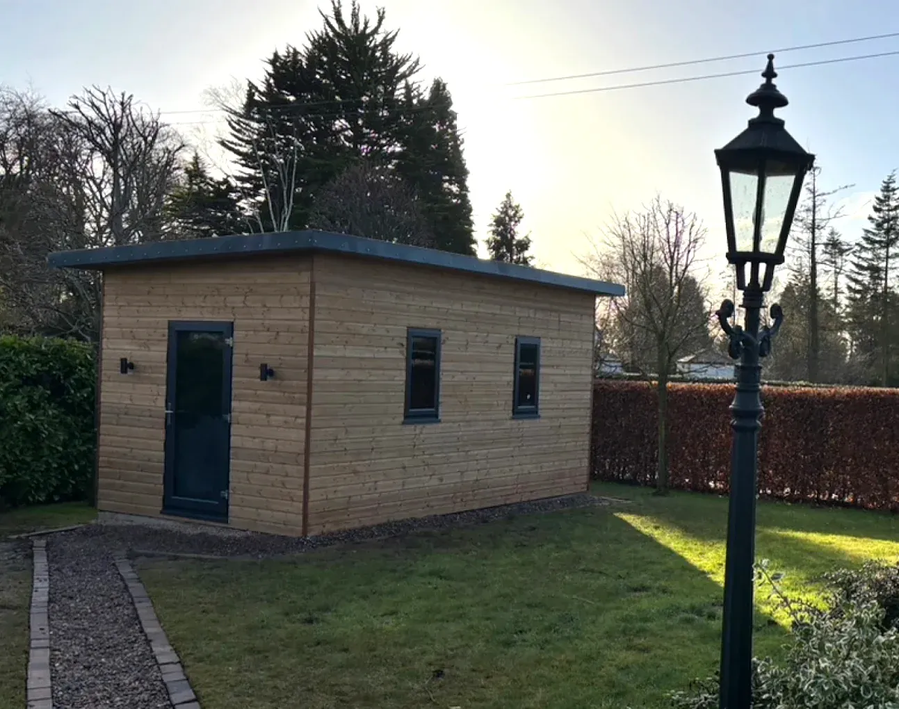 Purpose-built outside treatment facility used for massage and recovery appointments in Lurgan